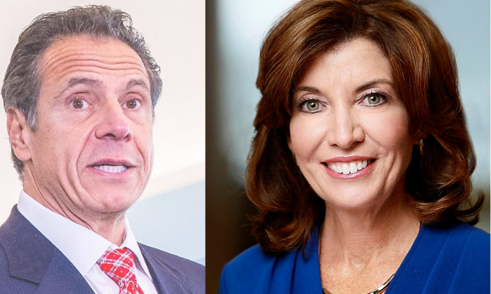 Outgoing Gov. Andrew Governor and incoming Gov. Kathy Hochul